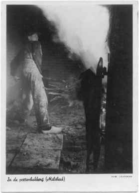 His father firing a wood kiln